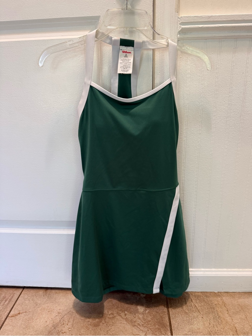 Wilson Womens Forest Green Slice Tennis Dress with white shorts